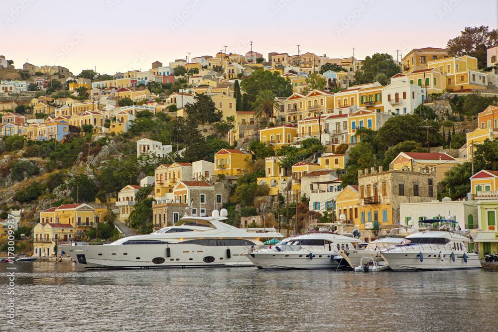 Yachts docked at harbour of Greek island Symi