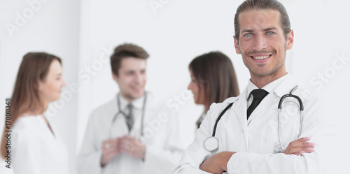smiling doctor therapist on blurred background.