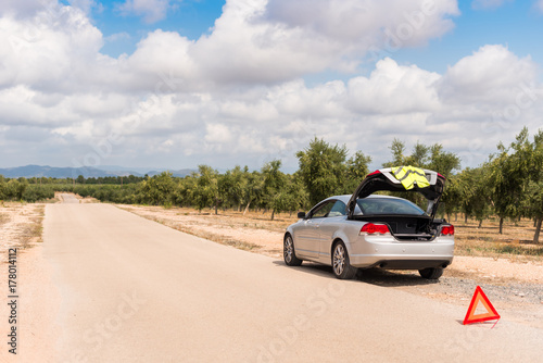 The Spanish landscape. The car broke down on the road. Copy space for text.