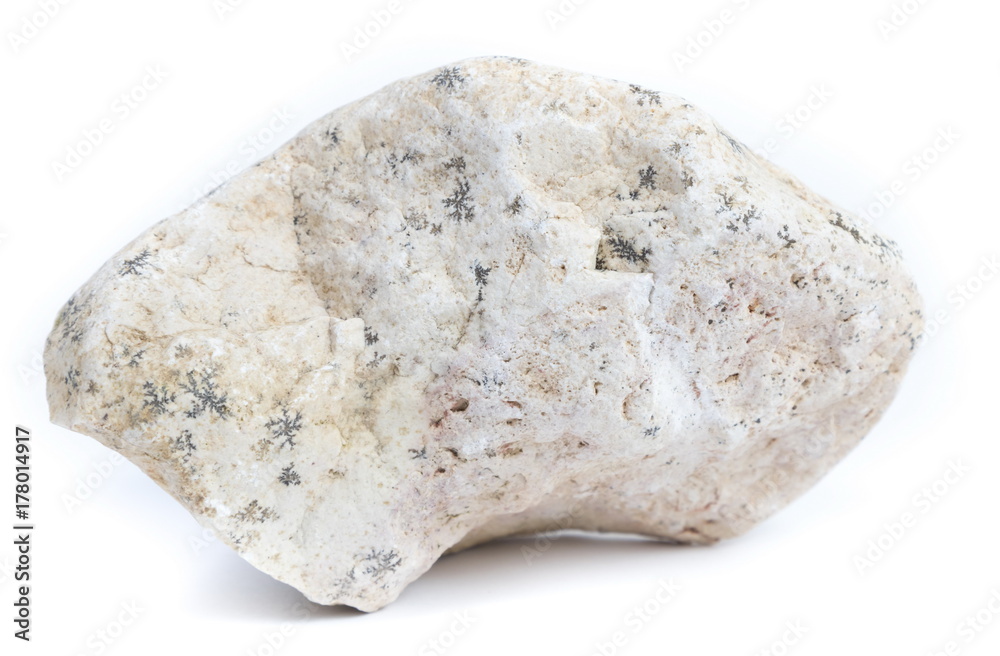 Single natural stone on white background, close-up Single natural stone on white background, close-up