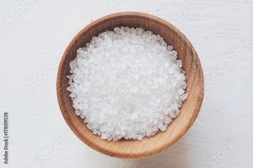 Small wooden bowls of black and white sea salt seasoning