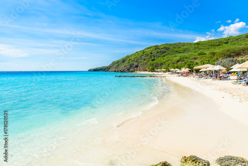 Porto Marie beach - white sand Beach with blue sky and crystal clear blue water in Curacao, Netherlands Antilles, a Caribbean Island