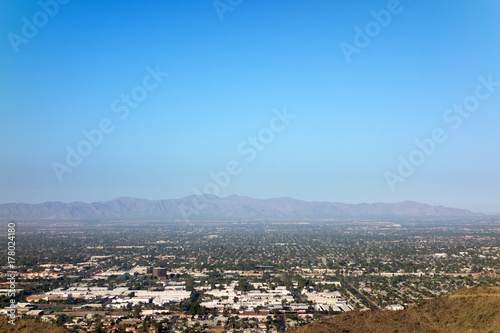 West side of Valley of the Sun looking at Glendale, Peoria and Phoenix as seen from North Mountain Park, Arizona. Copy space.