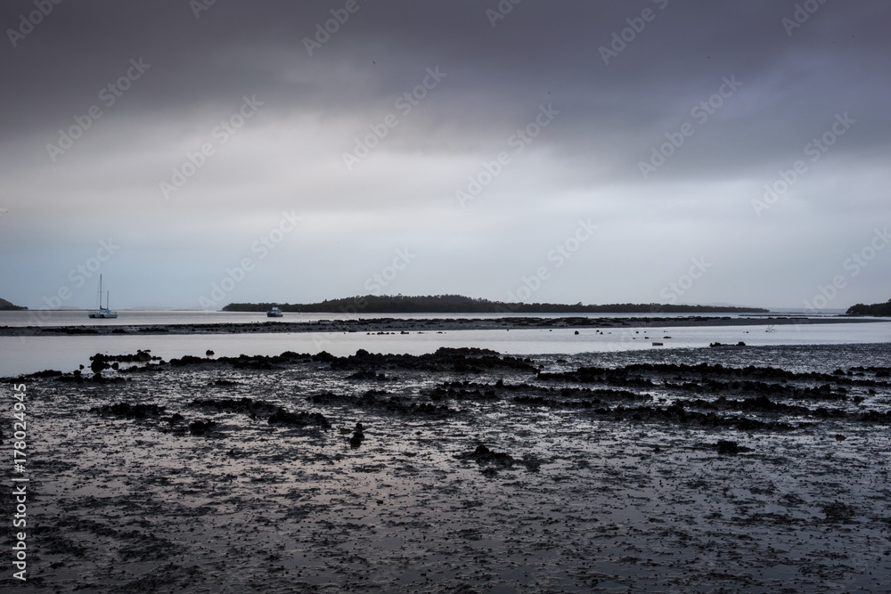 The early morning light battles to overcome the storm clouds.