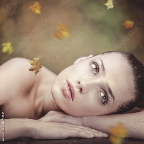 Beauty young woman dreaming. Autumnal female portrait