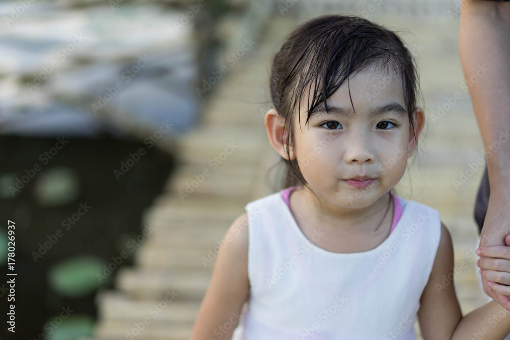 Asian cute little girl White dress Mother Shake hands Walking Asian cute little girl White dress Mother Shake hands Walking