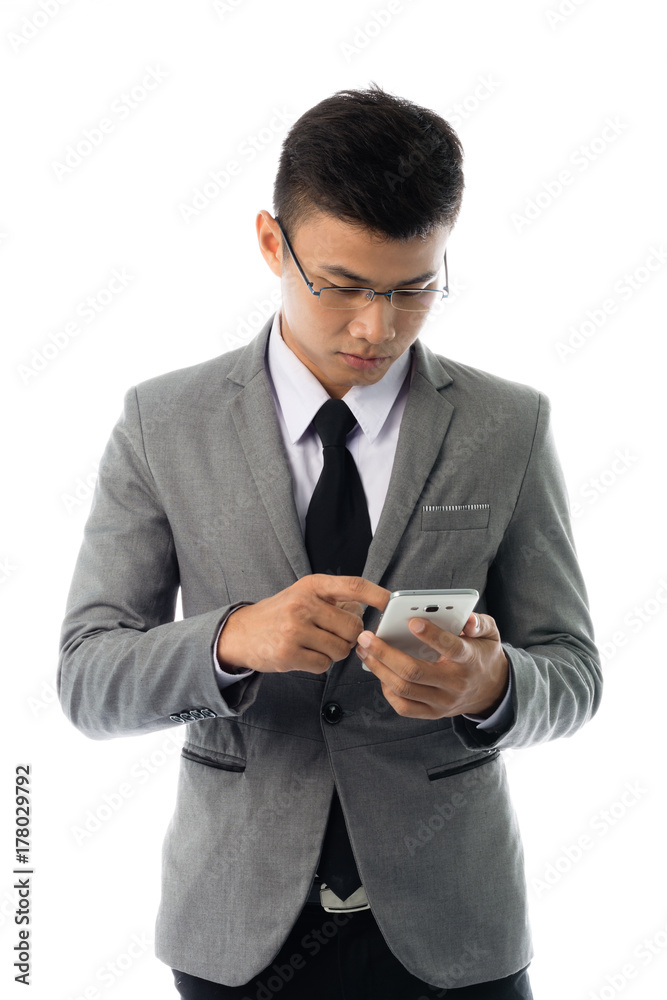 Portrait of a business man with glasses and smart phone. Isolated on white background Portrait of a business man with glasses and smart phone. Isolated on white background
