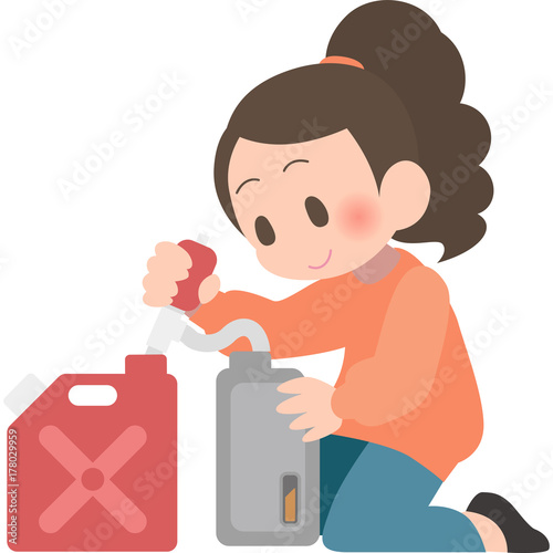 灯油を給油する女性