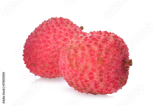 two whole red lychee isolated on white background