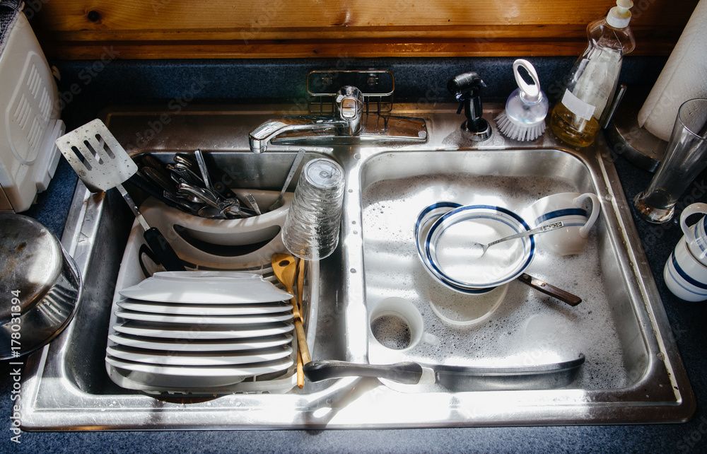 Sink filled with dishes and soapy water Stock Photo | Adobe Stock