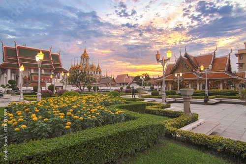 Sunset at Wat Ratchanatdaram Temple in Bangkok, Thailand.