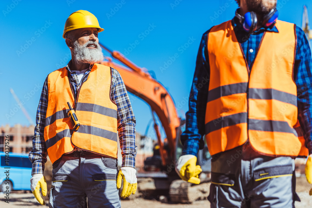 Fototapeta premium workers at construction site