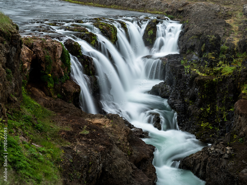 Small waterfalls in a river in Northern Iceland