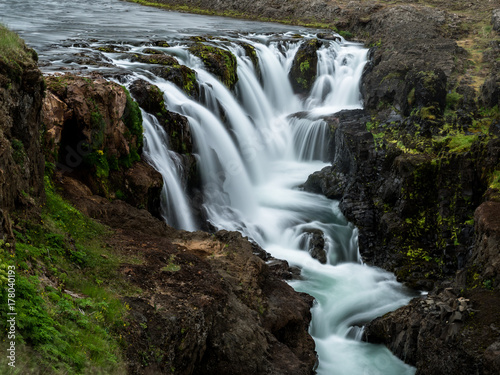 Small waterfalls in a river in Northern Iceland © Andreas Wonisch/Stocksy
