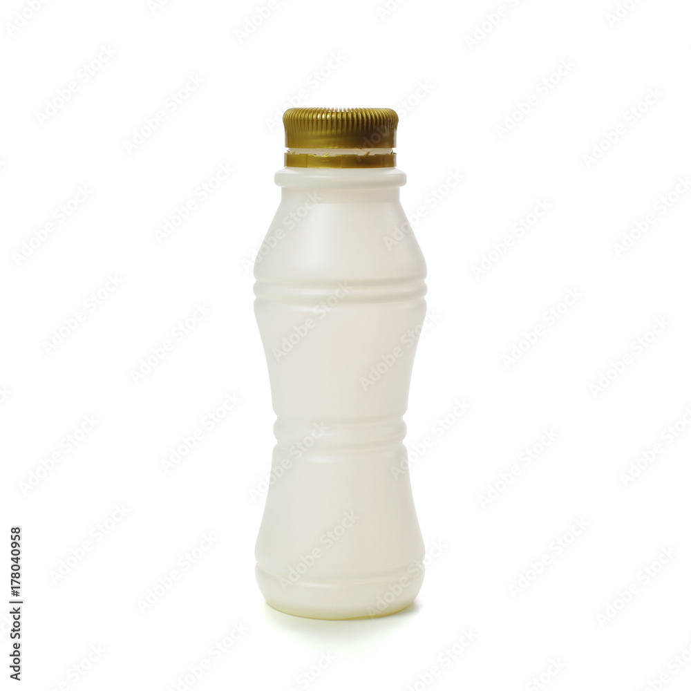 Empty plastic bottle with brown bottle cap