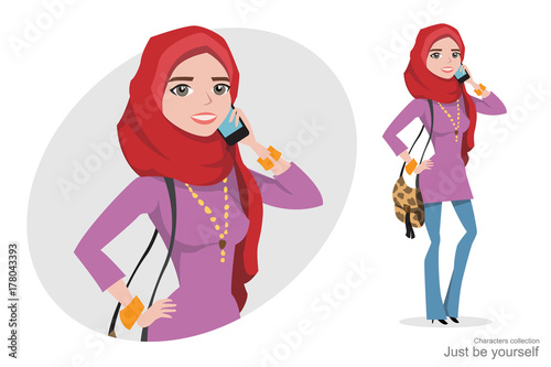 Muslim woman in hijab talking on the phone.