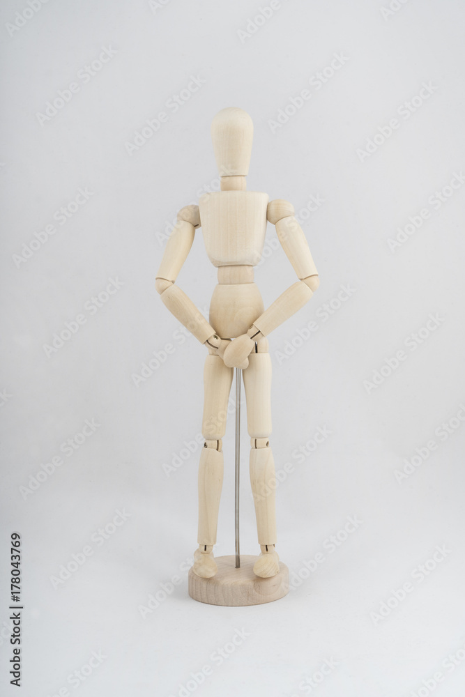 manikin with one hand in front of himself manikin with one hand in front of himself