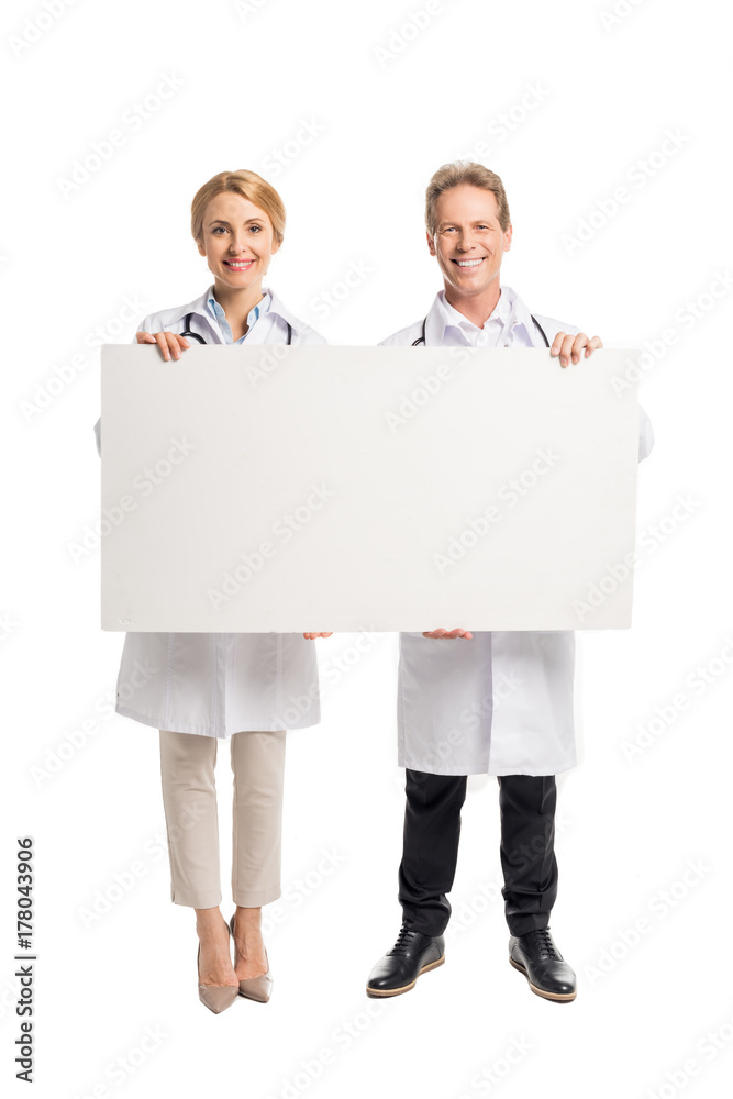 doctors holding blank banner