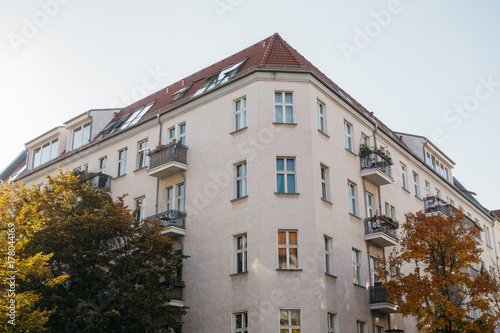 rose colored corner house in berlin