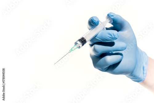 doctor holding syringe photo