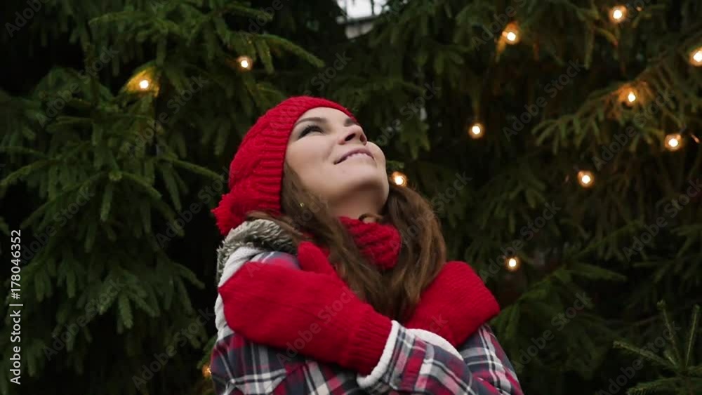 Young beautiful girl celebrates Christmas, new year, smiling Young beautiful girl celebrates Christmas, new year, smiling