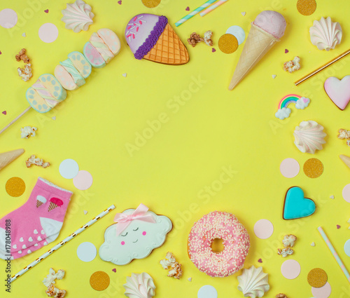 Cute Happy Birthday party background with Ice cream cone, gingerbreads, donut and marshmallows