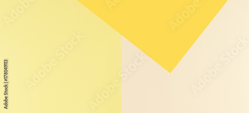 Colorful soft brown, beige and yellow paper banner background.
