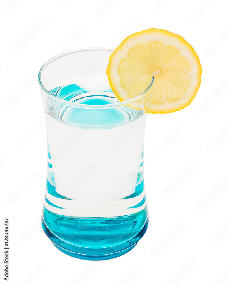Glass with water and lemon slice
