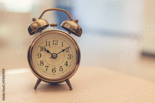 Retro alarm clock on table