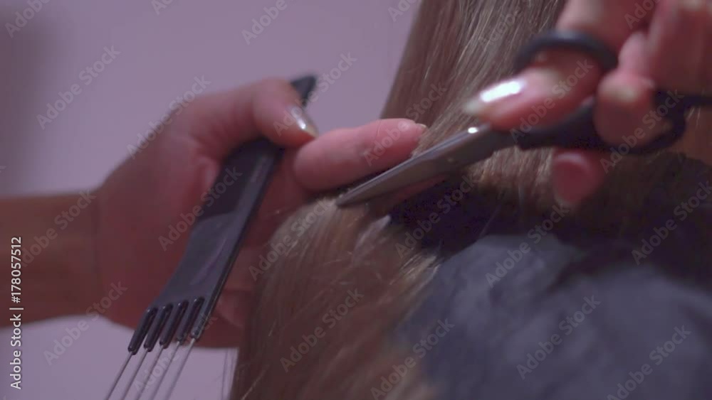 cut women's hair with scissors