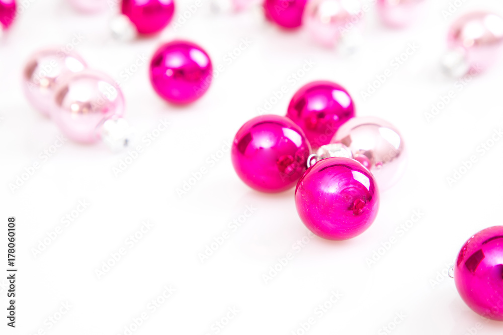 pink christmas balls isolated on white with copy space pink christmas balls isolated on white with copy space