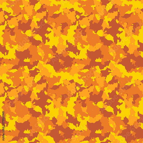 Yellow and orange UFO camouflage is a bright seamless pattern that can be used as neon camo print for clothing and background and backdrop or computer wallpaper