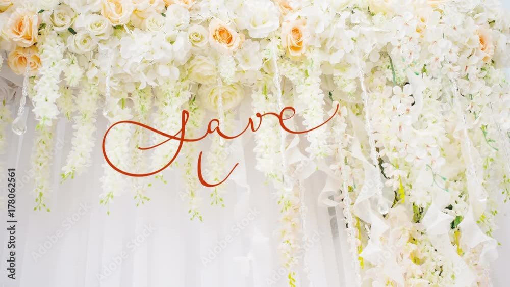 Written animation Save the Date calligraphy lettering text with Ornate frame elements on wedding arch with white and pink flowers. Vintage and filigree decoration. Filigree divider wedding Invitation