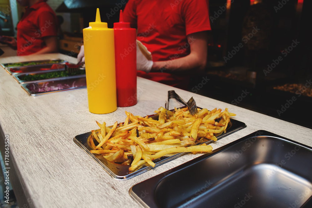Ketchup and mustard bottles at a restaurant