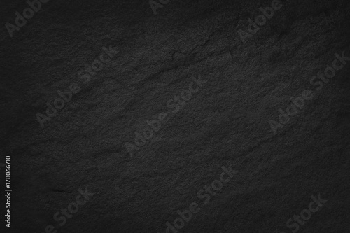 Dark brown slate texture in natural pattern with high resolution for background and design art work. Brown stone wall.