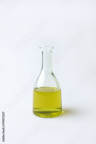 Glass transparent bottle with olive oil