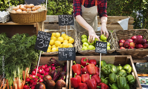 Greengrocer preparing fresh agricultural products