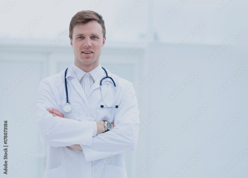 Portrait of a smiling doctor with a stethoscope around neck Portrait of a smiling doctor with a stethoscope around neck