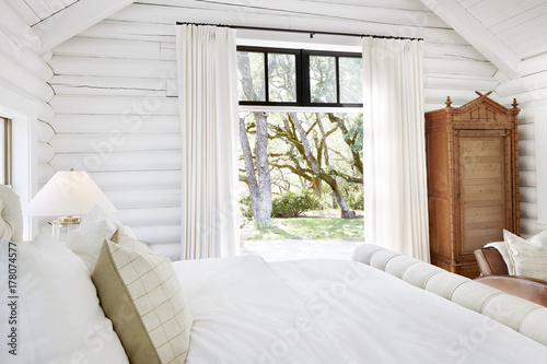 Bedroom in modern design log cabin photo
