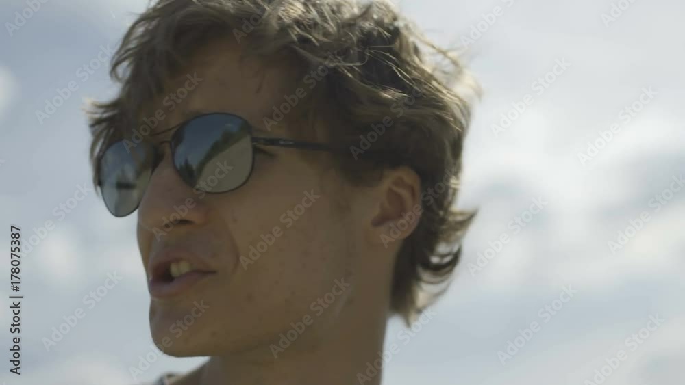 Man Singing Outdoors and Moving his Head to the Rhytm Man Singing Outdoors and Moving his Head to the Rhytm