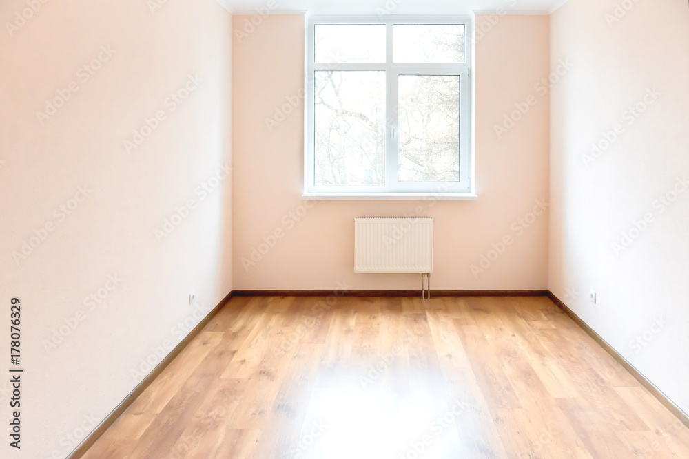 Empty room with window and wooden floor Empty room with window and wooden floor