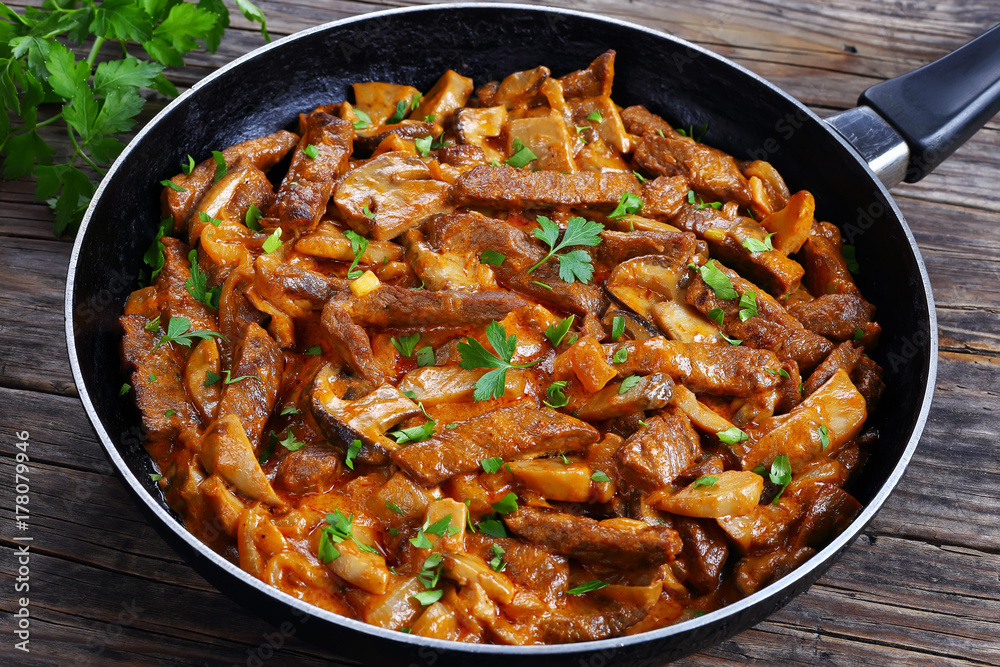 close-up of tasty beef stroganoff with mushrooms close-up of tasty beef stroganoff with mushrooms