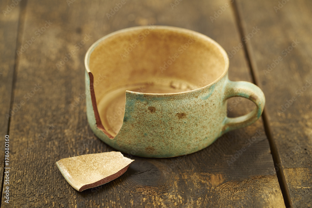 Broken cup Stock Photo Adobe Stock