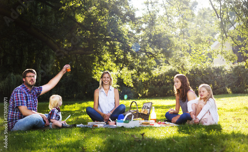 Family Picnic Outdoors Togetherness Relaxation Concept © Rawpixel.com