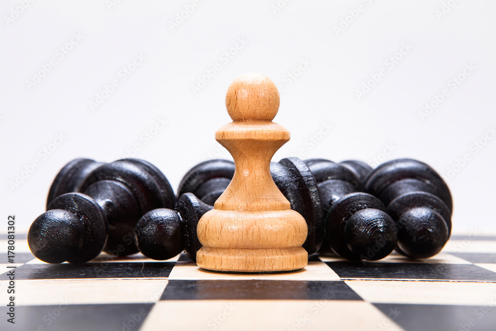 White and black pawns on the chessboard White and black pawns on the chessboard
