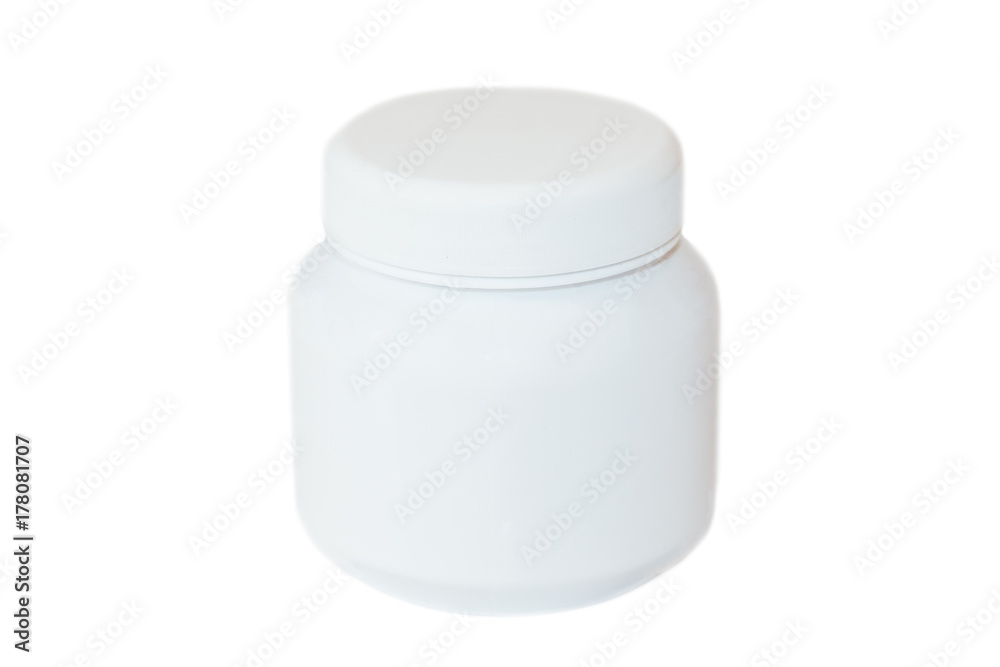 The white bottle or container for ointment, balm or tablets on a white background The white bottle or container for ointment, balm or tablets on a white background