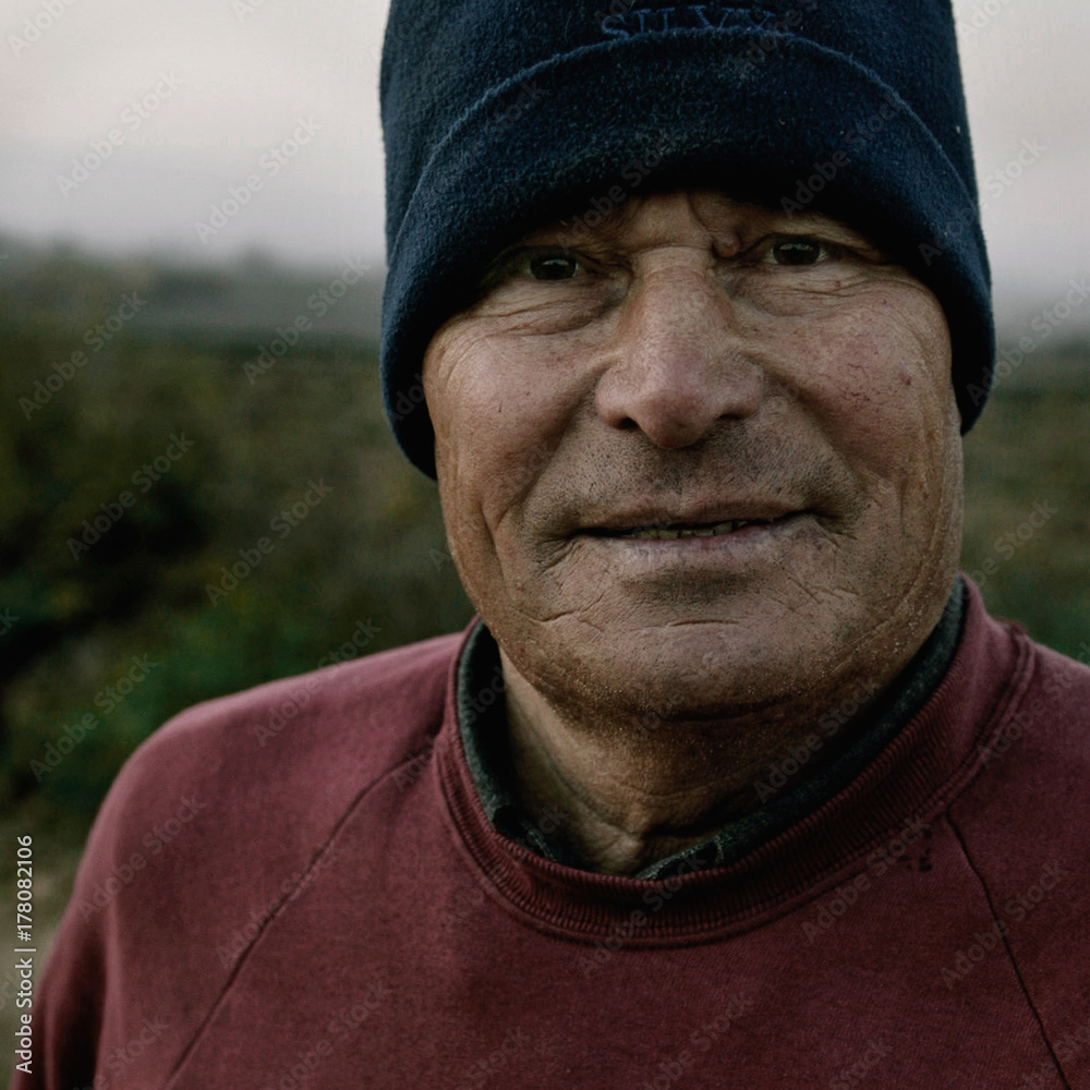 Portrait of an old country man in the fields Portrait of an old country man in the fields