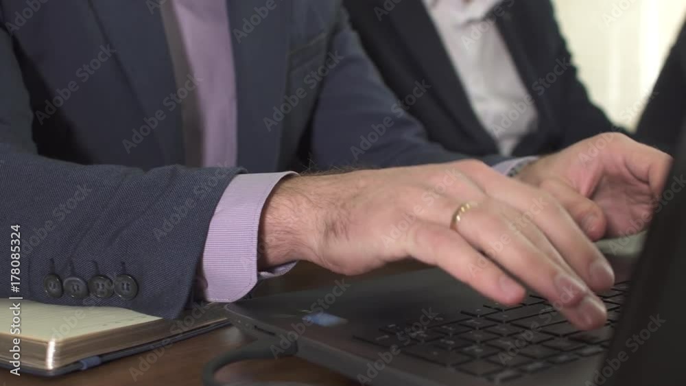 Businessman working in office. He wrote in the diary. Businessman working in office. He wrote in the diary.