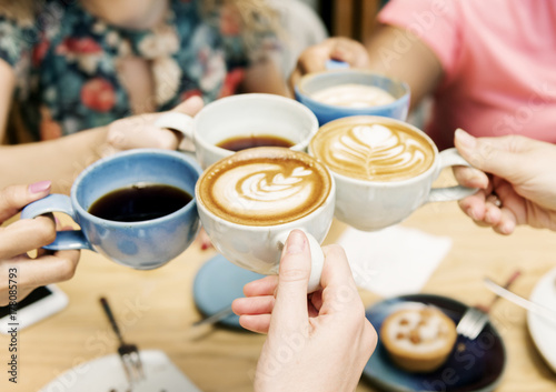 Friends having coffee together
