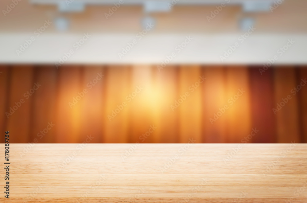 Empty wood table and blurred booked cafe light background. product display template. Business presentation Empty wood table and blurred booked cafe light background. product display template. Business presentation